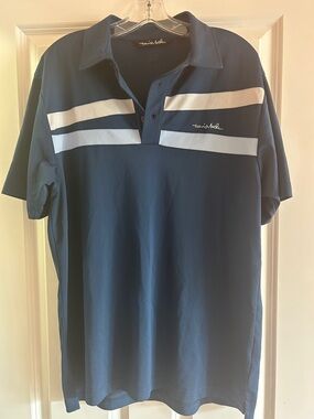 Travis Mathew Navy Polo with White and Light Blue Chest Stripes